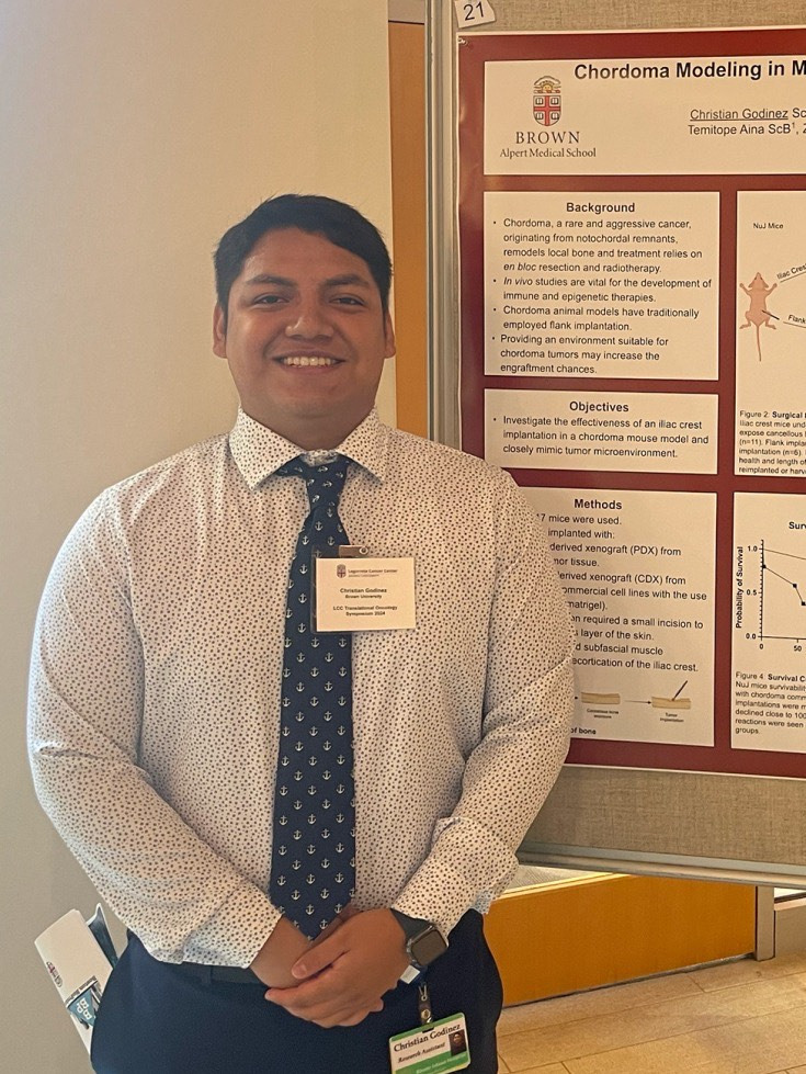 Christian Godinez with Poster